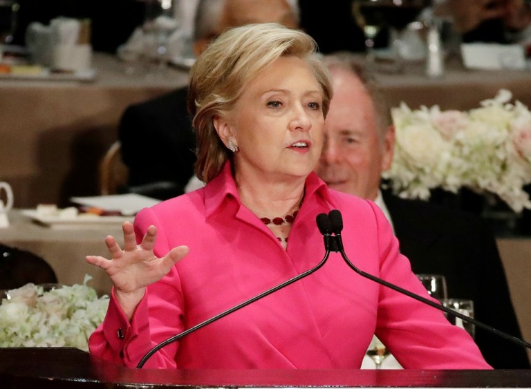 While Donald Trump was predictably booed at an unfriendly event, the media ran with it in order to smear him. Further, they ignored this same group booing Hillary Clinton. (AP Photo)