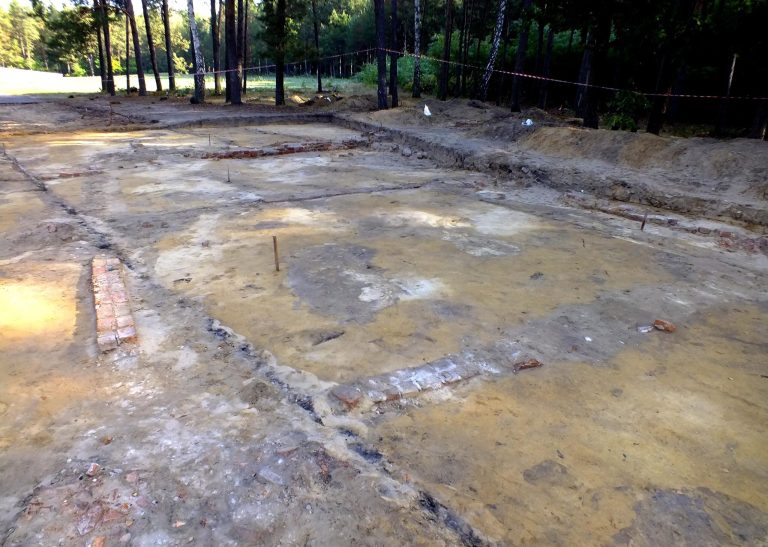 This photo taken Wednesday, Sept. 17, 2014, and released by Yad Vashem International Institute for Holocaust Research shows the remains of a building that housed gas chambers at Sobibor, a death camp operated by Nazi Germany in occupied Poland in Sobibor, Poland. Polish and Israeli Holocaust researchers announced Wednesday that they have discovered the exact location of the building that housed gas chambers at the camp. (AP Photo/Yoram Haimi, Yad Vashem International Institute for Holocaust Research)