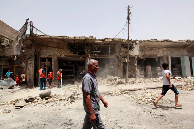 Fighting rages over Iraqi town north of Baghdad