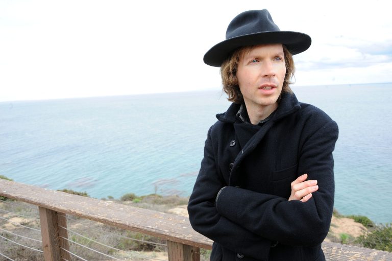   Musician Beck poses for a portrait at his home on Friday, Dec. 14, 2012, in Malibu, Calif. Beck Hansen wants you to think about the way music has changed over the last century and what that means about how human beings engage each other these days. Laboring over the intricate and ornate details of his new 