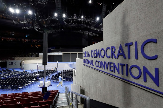 Work continues inside the convention hall before the Democratic National Convention in Philadelphia. (AP Photo/Alex Brandon)