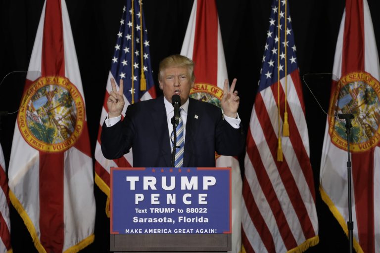 Hillary Clinton and Donald Trump are locked in a nail-biter in Florida as returns roll in Tuesday night. (AP Photo/Chris O'Meara)