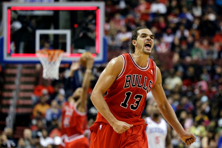   Chicago Bulls' Joakim Noah reacts after Philadelphia 76ers' Spencer Hawes failed to score at the end of the first quarter of an NBA basketball game, Wednesday, Dec. 12, 2012, in Philadelphia. (AP Photo/Matt Slocum)  