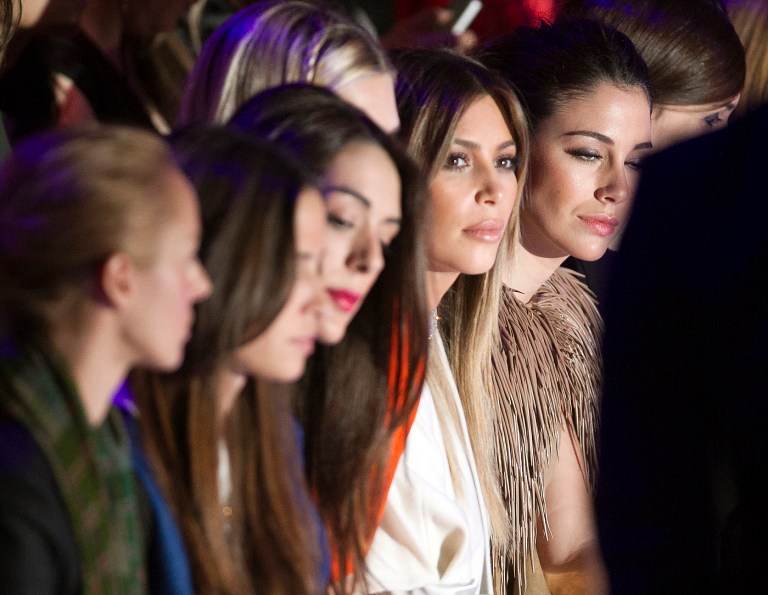 Kim Kardashian, second from the right, attends Stephane Rolland's Spring-Summer 2014 Haute Couture fashion collection presented in Paris, Tuesday, Jan.21, 2014. (AP Photo/Jacques Brinon)