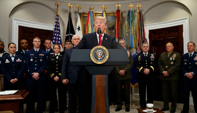 In terms of America's core national security interests and strategic priorities, the NDAA Trump signed in many ways contradicts his foreign policy promises during the campaign. (AP Photo/Evan Vucci)