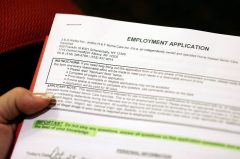 US jobless aid applications rise to 311,000