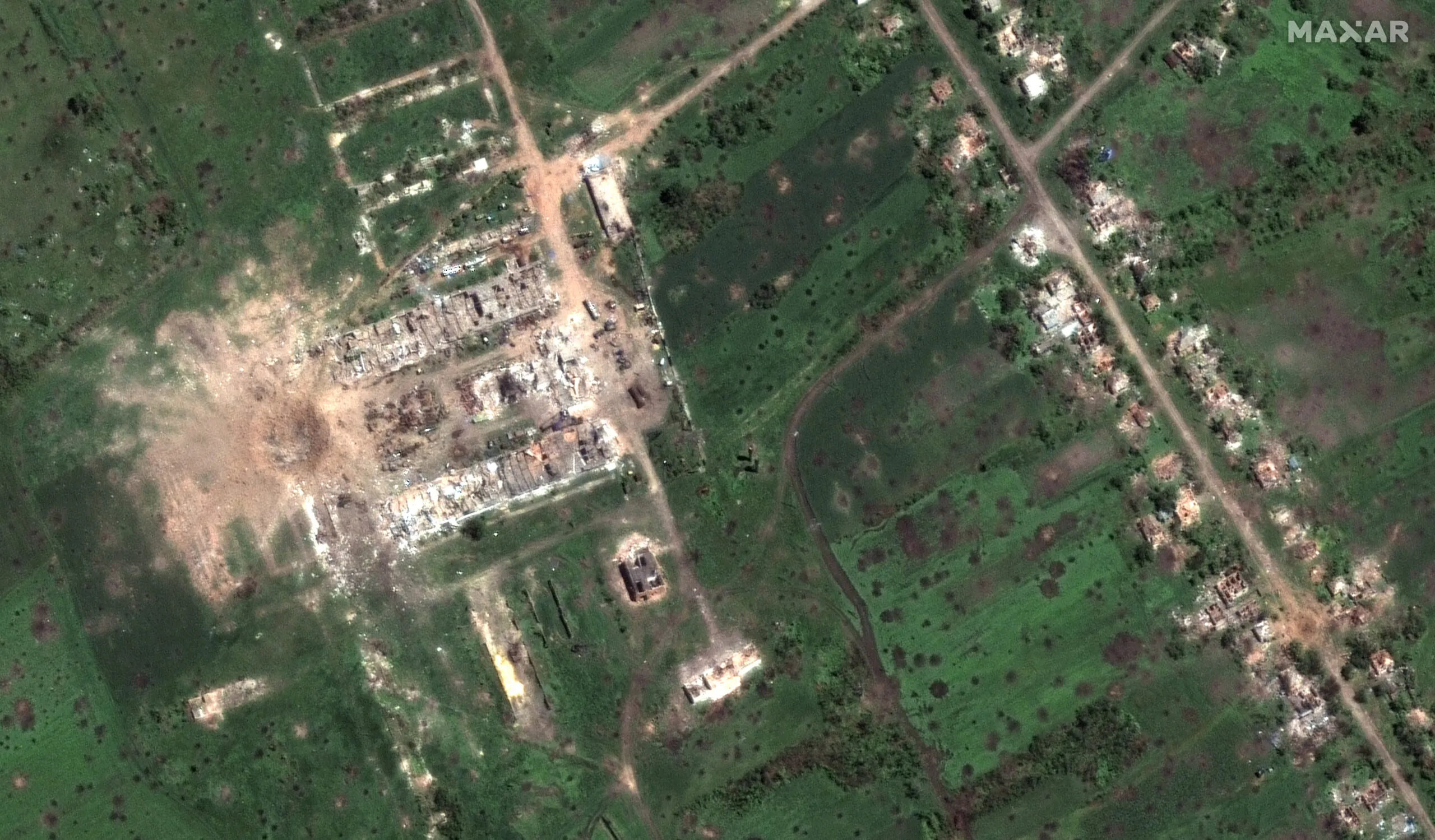 10_large 40_meter crater and destroyed buildings_dovhenke_nw of slovyansk ukraine_6june2022_wv2.jpg