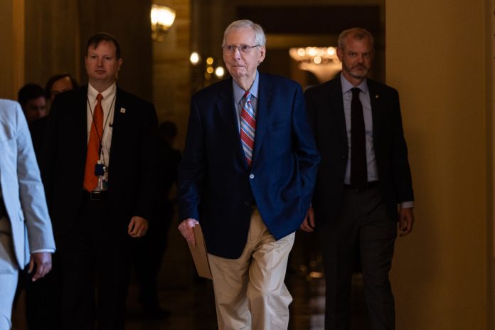Senate Minority Leader Mitch McConnell (R-KY) walks to the Senate chamber to speak during the opening of the Senate on Tuesday, Sept. 5, 2023.