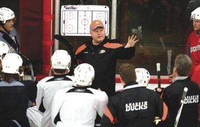 Leonard Ortiz/The Orange County Register via AP
Bruce Boudreau had a busy week: He was fired by the Capitals on Monday, hired by the Ducks on Wednesday and on the ice coaching in Anaheim on Thursday.