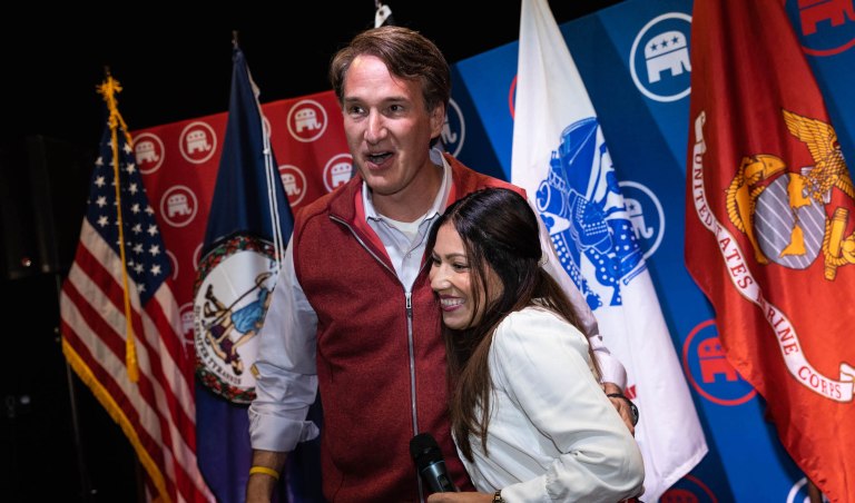Virginia Gov. Glenn Youngkin (R) embraces House candidate Yesli Vega (R) at a rally in Fredericksburg, Virginia on Oct. 17.