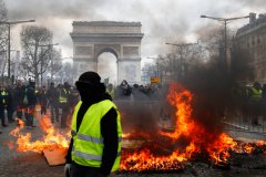 French protesters riot in Paris, accuse Macron of ‘hot air’