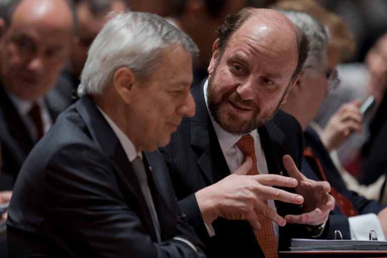   Chile's Foreign Minister Alfredo Moreno Charme, right, gestures when talking to agent and ambassador Albert van Klaveren Stork, left, at the start of hearings in a dispute between Peru and Chile over the two countries' maritime boundary at the International Court of Justice in The Hague, Thursday Dec. 6, 2012. (AP Photo/Peter Dejong)  