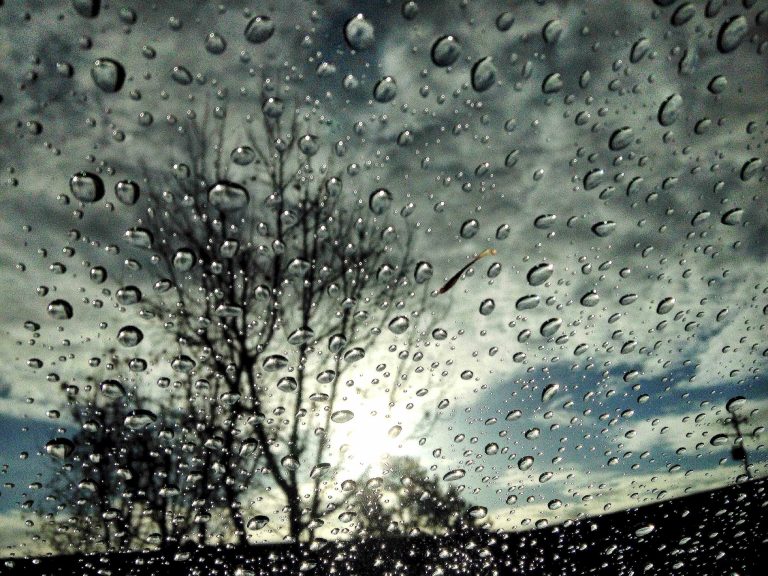Raindrops appear on a windshield following the first rain of the year, early Thursday, Jan. 30, 2014, in Novato, Calif. Northern California is finally getting rain after some areas have gone without measurable moisture for weeks. But the precipitation won't help much to ease the drought that has plagued the region. (AP Photo/Marin Independent Journal, Robert Tong)