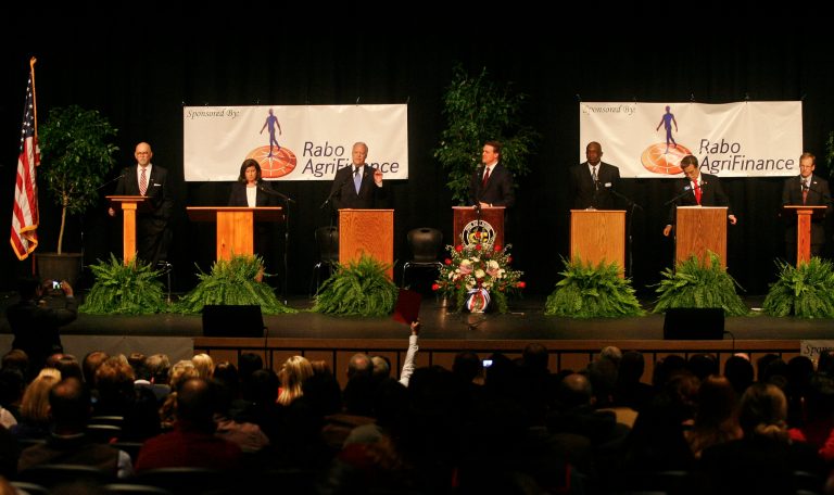 U.S. Rep. Paul Broun (R-Athens), third from left, speaks during a debate as he is surrounded by, from left, patent attorney Art Gardner, former Secretary of State of Georgia Karen Handel, Georgia Ports Authority board member David Perdue, conservative political activist Derrick Grayson, businessman Eugene Yu, and U.S. Rep. Jack Kingston (R-Savannah) Saturday, Jan. 18, at the Cook County High School Performing Arts Center in Adel, Ga. (AP Photo/Phil Sears)