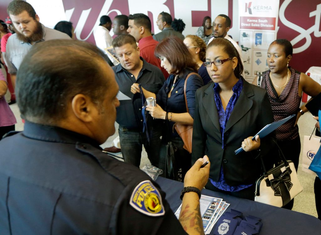Applications for US jobless benefits fall sharply