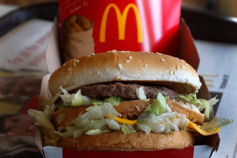 In this Tuesday, Jan. 21, 2014, photo, a McDonald's Big Mac sandwich is photographed at a McDonald's restaurant in Robinson Township, Pa. McDonald's saw a key sales figure drop in the U.S. again in February 2014, as the world's biggest hamburger chain struggles to beat back competition and adapt to changing eating habits. (AP Photo/Gene J. Puskar)