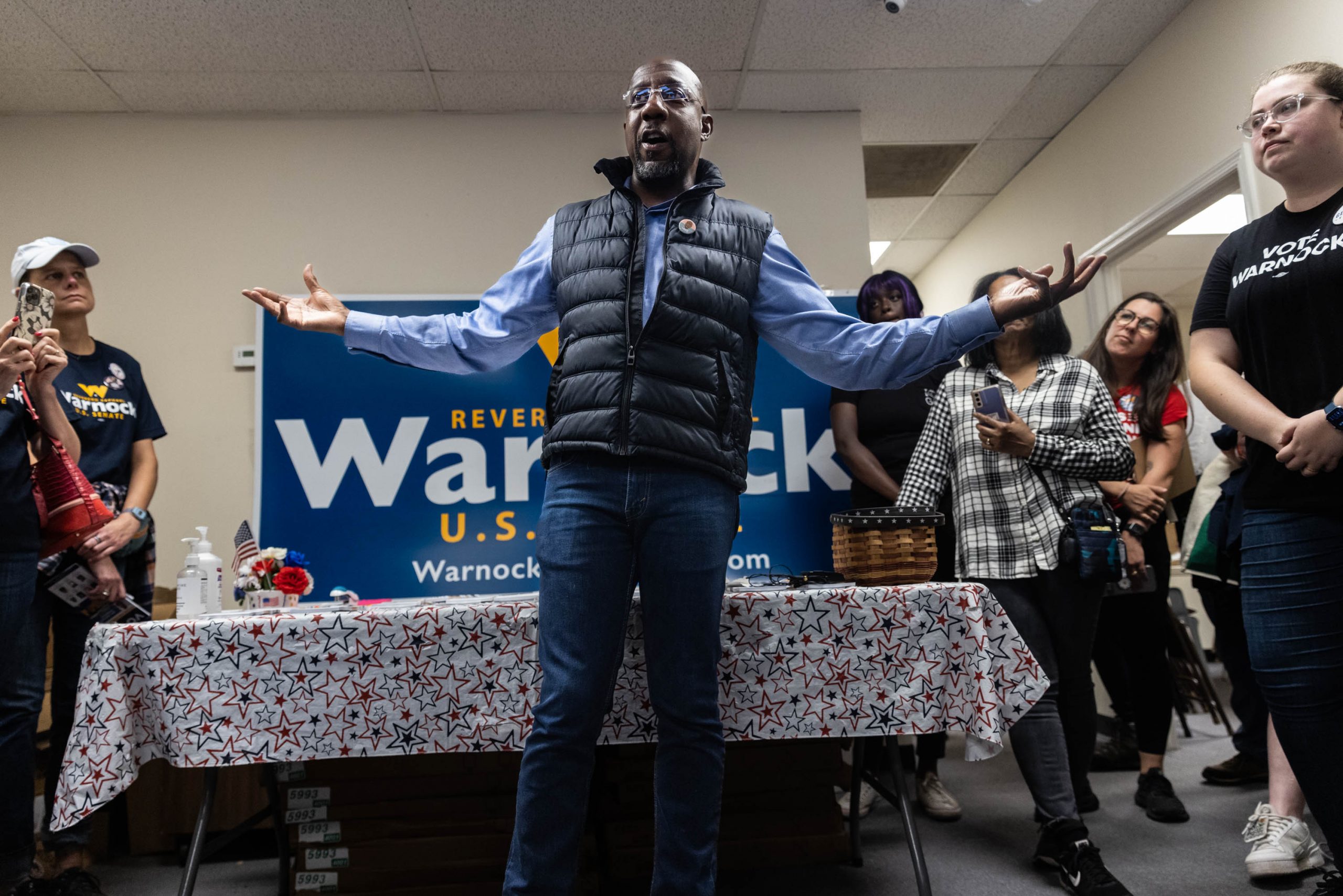Reverend Raphael Warnok speaks at a Democratic field office in Augusta, Georgia, to talk with campaign volunteers, Saturday, November 5, 2022 