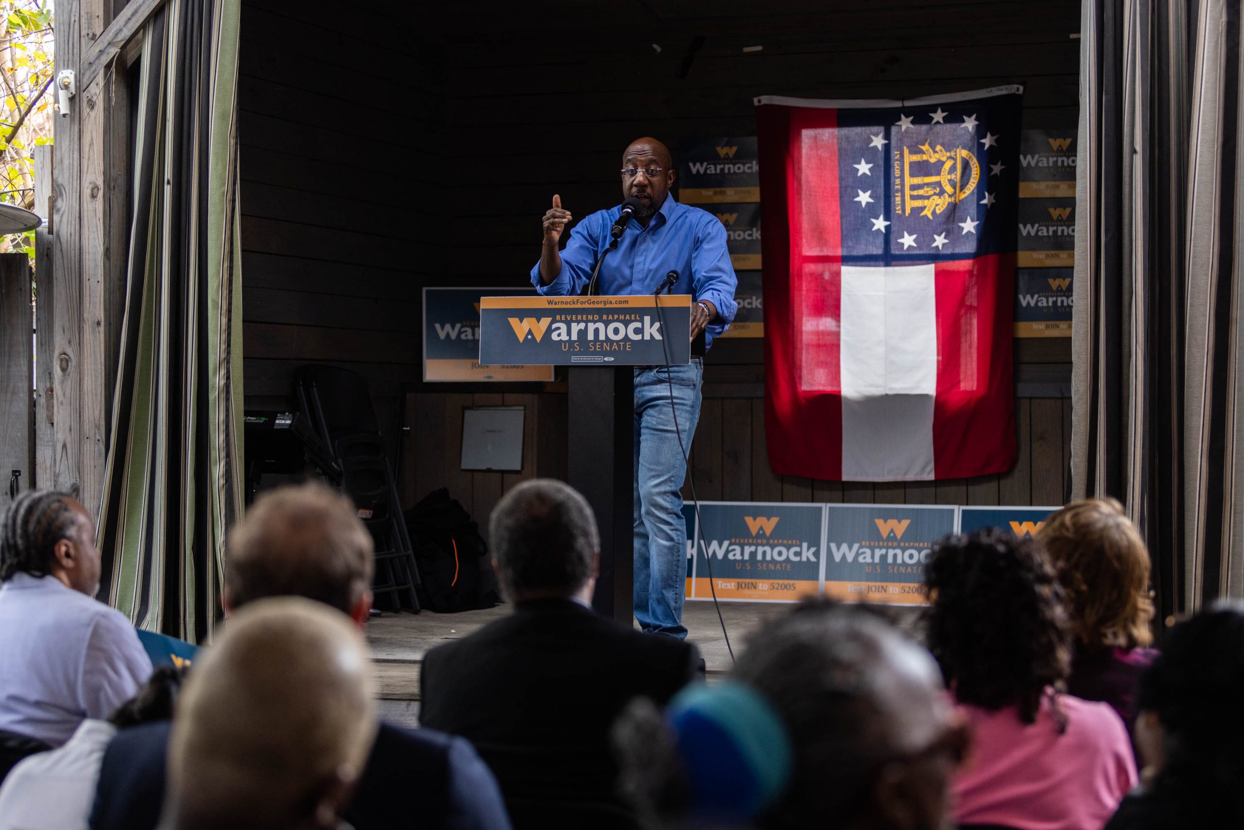 Sen. Raphael Warnock speaks at a campaign rally in Macon, Georgia, Monday, November, 7, 2022