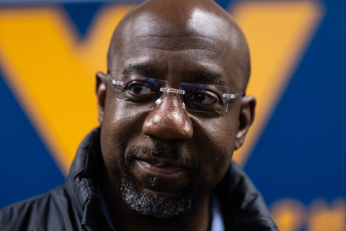 Sen. Raphael Warnock speaks at a Democratic field office in Augusta, Georgia, on November 5.