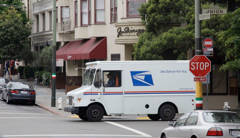 Despite the United States Postal Service's prominent place in American life, and its $15 billion in outstanding debt, politicians rarely talk about how to improve the Postal Service, let alone actually reform it. (AP Photo/Eric Risberg)
