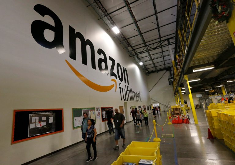 Amazon, the country's largest bookseller, wants to cap the price of e-books at $9.99. Publishers say they cannot cover their costs at $9.99 and want to charge more. (AP Photo)