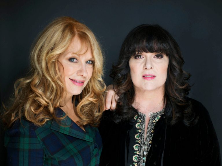   CORRECTS LEFT TO RIGHT INDENTIFICATIONS--FILE - This Oct. 1, 2012 file photo shows sisters Nancy, left, and Ann Wilson from Heart in New York. The eclectic group of rockers Rush and Heart, rappers Public Enemy, songwriter Randy Newman, 