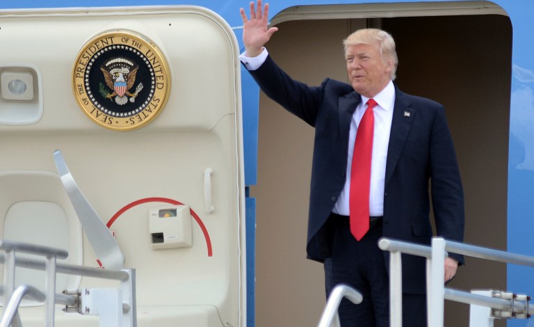 Politico cited White House officials in reporting Trump's foreign swing later this month is part of his trip to Brussels for a NATO meeting on May 25 and to Sicily for a G-7 summit on May 26. (Kent D. Johnson/Atlanta Journal-Constitution via AP)