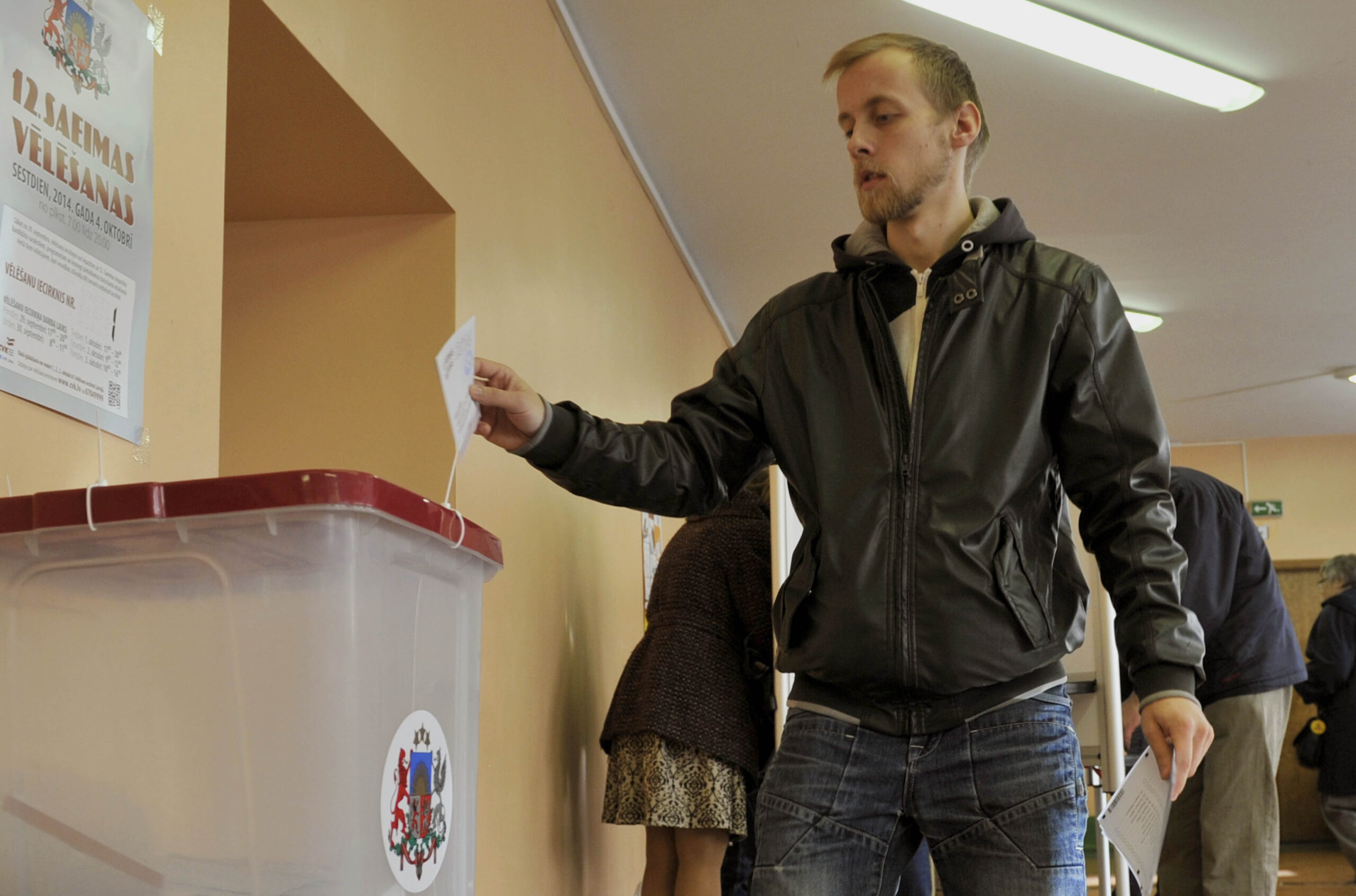 Latvia’s center-right ruling coalition wins vote