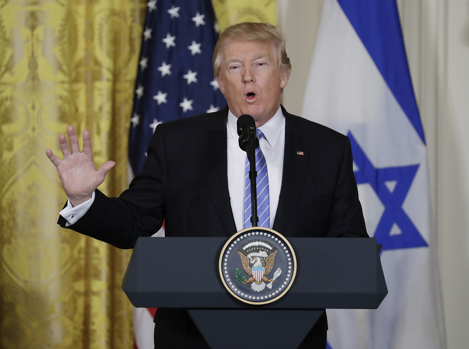 Trump defends Flynn after firing him: ‘He was treated very unfairly’