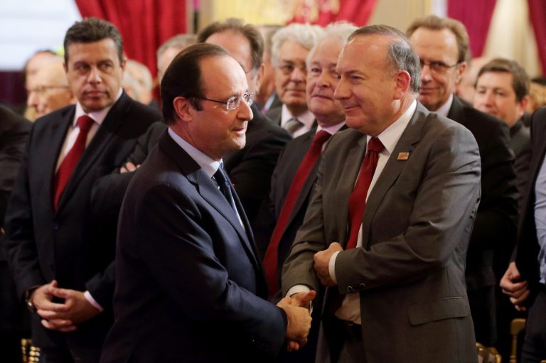 French leader to CEOs: Hire more to get tax cut