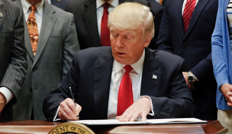 President Trump signed the $1.2 trillion spending agreement to fund the government through September early Friday afternoon. (AP Photo/Pablo Martinez Monsivais)
