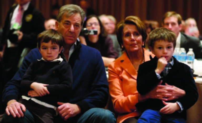 House Minority Leader Nancy Pelosi with her husband Paul and grandchildren as they listen to President Obama speak at the House Democratic Issues Conference at the Landsdowne Resort in Leesburg, Va. (AP Photo/Charles Dharapak)