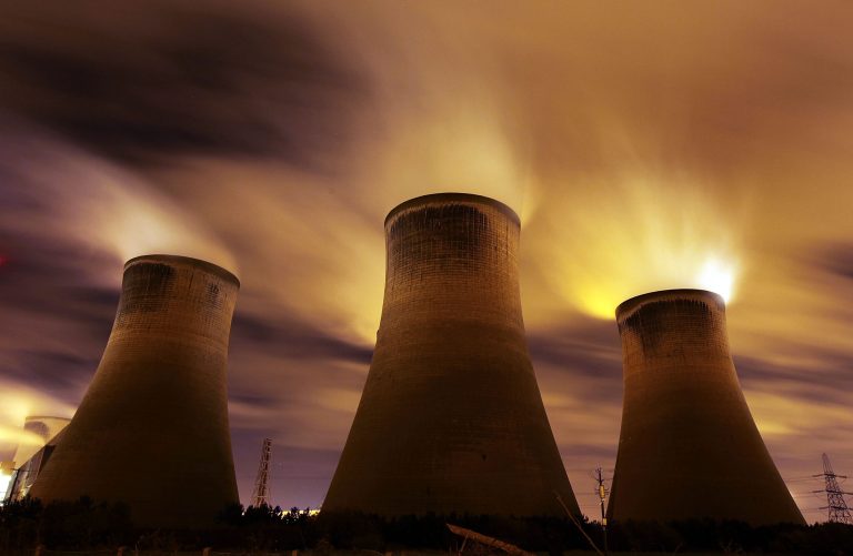 The coal fueled Fiddlers Ferry power station emits vapour into the night sky on November 16, 2009 in Warrington, United Kingdom.