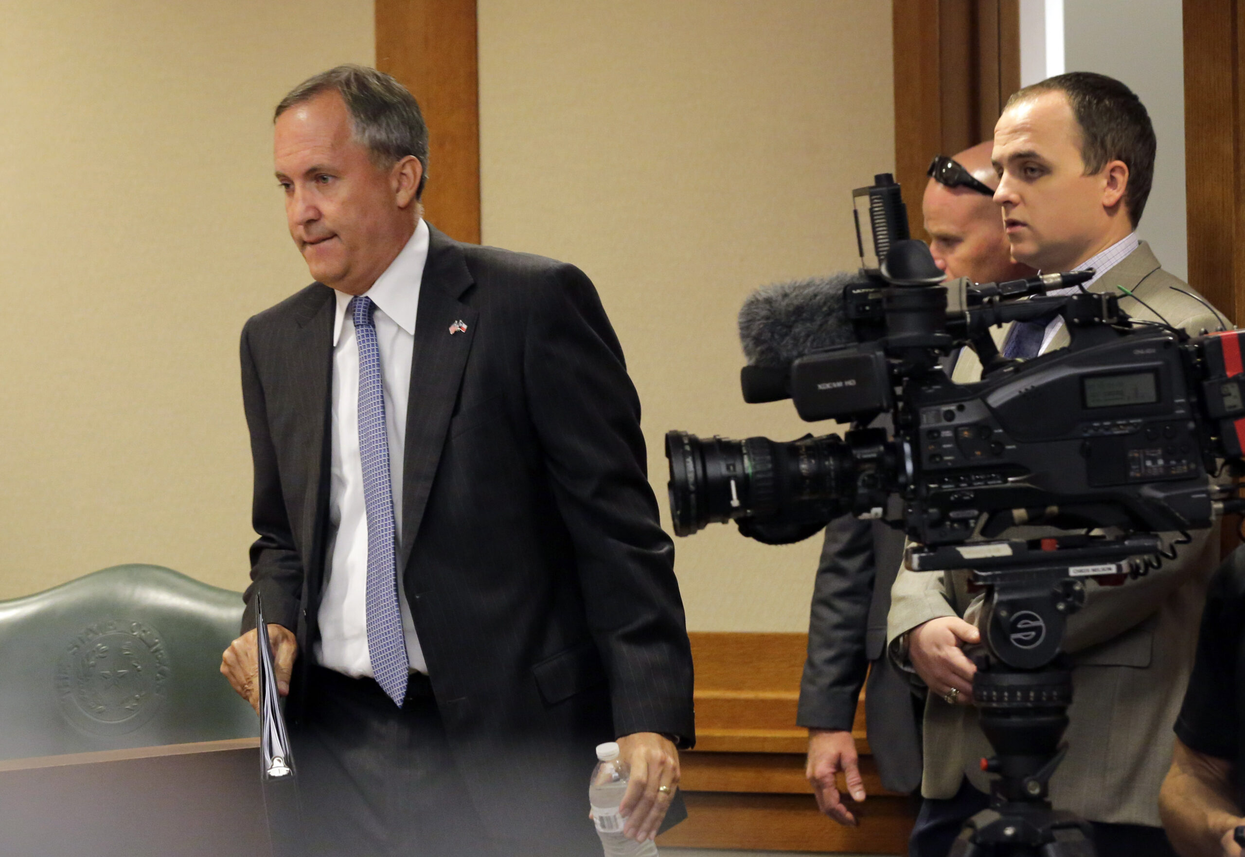 Texas attorney general booked on three felony indictments