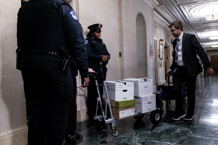 Trump taxes: Boxes of documents seen being wheeled into House committee room ahead of meeting