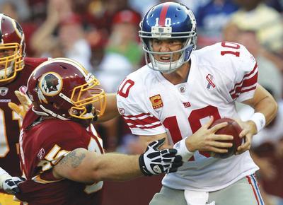 Ronald Martinez/Getty Images
Rookie defensive tackle Chris Neild, who was the next-to-last player selected in April's draft, had two sacks of Eli Manning during Sunday's win over New York.