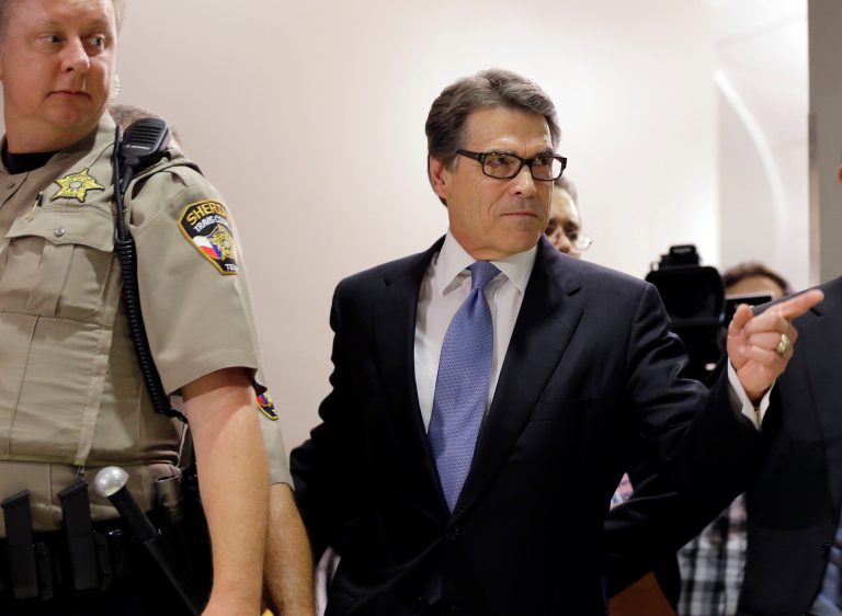 Last Friday Gov. Rick Perry, R-Texas, was indicted on abuse of power charges and on Tuesday he turned himself in to Travis County authorities. Now the Texas Republican is hitting the road. (AP Photo)