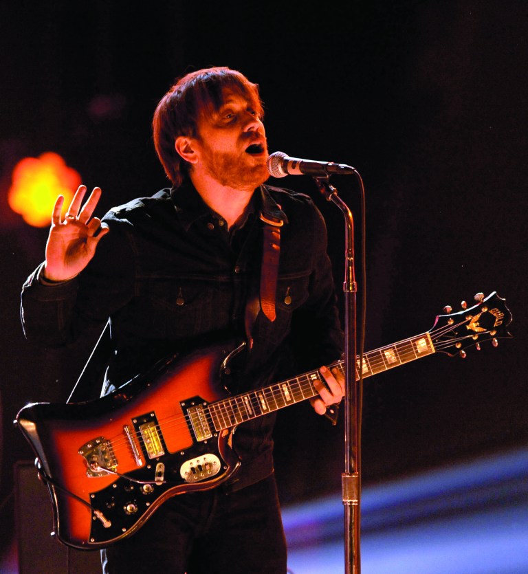 FILE - In a Dec. 10, 2011 file photo, Dan Auerbach, lead singer of The Black Keys, performs at Spike TV's Video Game Awards in Culver City, Calif. The band's attorney informed a federal judge on Monday, Nov. 26, 2012, that it had settled a lawsuit with Pizza Hut over the alleged misuse of its music in a commercial. The Black Keys reached a settlement with The Home Depot over similar allegations earlier this month, court records show. (AP Photo/Chris Pizzello, File)