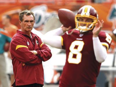 Hans Deryk/AP
Coach Mike Shanahan, left, quarterback Rex Grossman and the Washington Redskins ended a six-game losing streak last week with a win over the Seahawks.