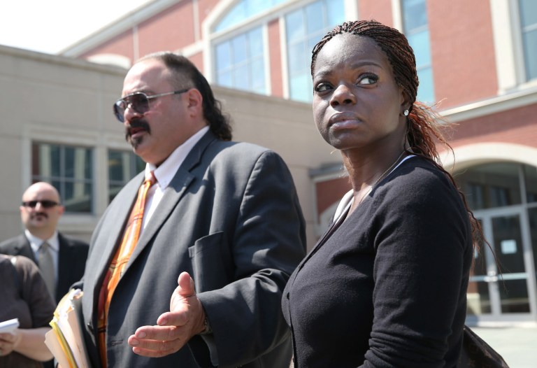 Lawyer Evan Nappen, left, and Shaneen Allen, of Philadelphia, Pa., talk to media outside Atlantic County Criminal Court in Mays Landing, NJ, after a motion to dismiss the gun possession charges against her was denied. (AP/The Press of Atlantic City, Ben Fogletto)