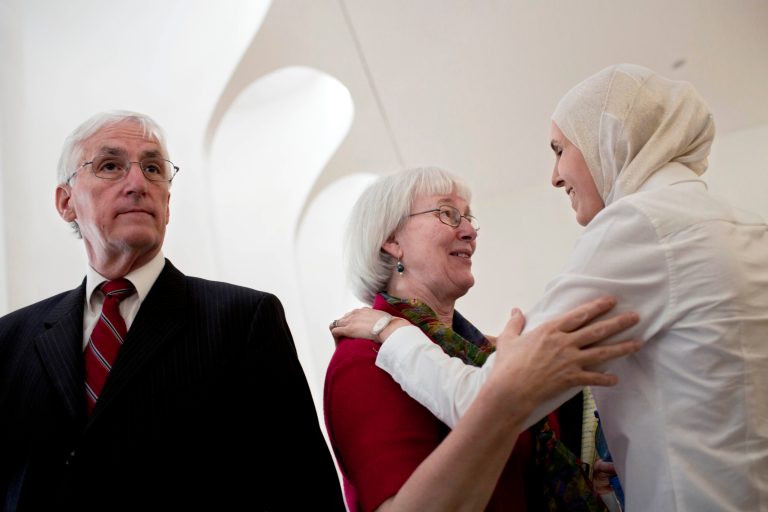 Cindy Corrie, center, and Craig Corrie, left, the parents of Rachel Corrie, a pro-Palestinian activist who was crushed to death by an Israeli bulldozer in Gaza in 2003, meet their lawyer at the Supreme Court In Jerusalem, Wednesday, May 21, 2014. The family of slain American activist Rachel Corrie asked Israel's Supreme Court on Wednesday to overturn a verdict clearing the military of any wrongdoing in her death. Corrie, 23, was crushed to death by an Israeli military bulldozer during a protest in the Gaza Strip in March 2003. (AP Photo/Oded Balilty)