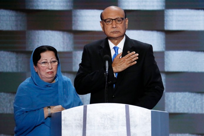 As his wife stood by, Khizr Khan attacked Trump. Their son was a Marine killed in Iraq. (AP Photo/J. Scott Applewhite)