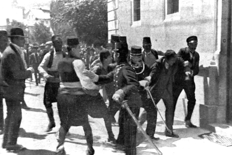 Bosnian Serb nationalist Gavrilo Princip, right, is captured by police and taken to the police station in Sarajevo, Yugoslavia, June 28, 1914, after he assassinated the Archduke Franz Ferdinand, heir to the Austro-Hungarian throne, and his wife. This year marks the 100th anniversary of World War I. (AP File)