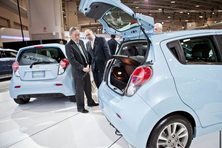 Energy Secretary Steven Chu marvels at the size of the Chevy Spark’s trunk