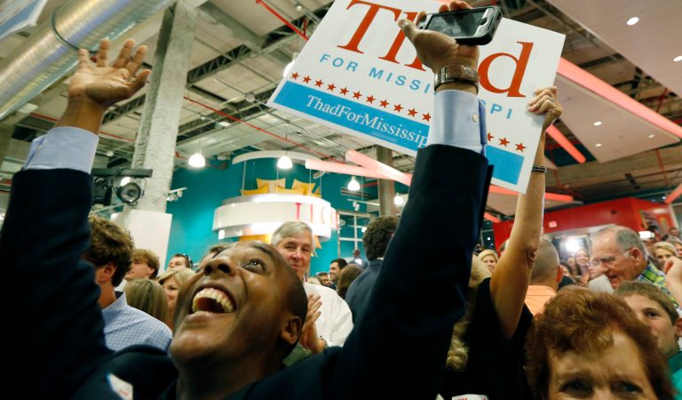 Marcus Ward of Jackson, Miss., celebrates the news that U.S. Sen. Thad Cochran, R-Miss., wins his primary runoff race against state Sen. Chris McDaniel, of Ellisville, for the GOP nomination for U.S. Senate at his victory party, Tuesday, June 24, 2014 in Jackson, Miss. Cochran defeated challenger Chris McDaniel in Mississippi's Republican primary runoff Tuesday, successfully expanding the original primary electorate to deal another blow to tea party conservatives in a midterm election year dominated mostly by traditional Republican powers. (AP Photo/Rogelio V. Solis)
