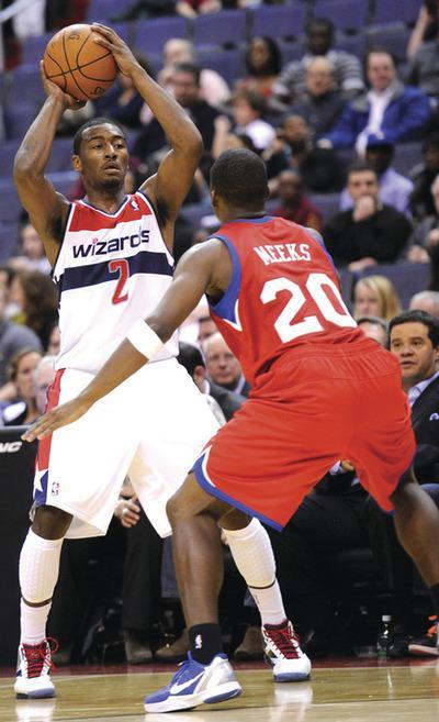 Nick Wass/AP
Washington Wizards point guard John Wall missed 18 of 26 shots in two preseason losses to the Philadelphia 76ers.