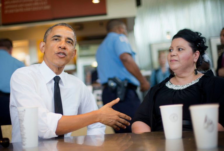 President Barack Obama sits down to have lunch with Shelby Ramirez at a Chipotle Mexican Grill in Washington, Monday, June 23, 2014, before they attending the White House Summit on Working Families. Obama is encouraging more employers to adopt family-friendly policies, part of a broader effort to convince employers that providing more flexibility is good for business as well as workers. (AP Photo/Pablo Martinez Monsivais)