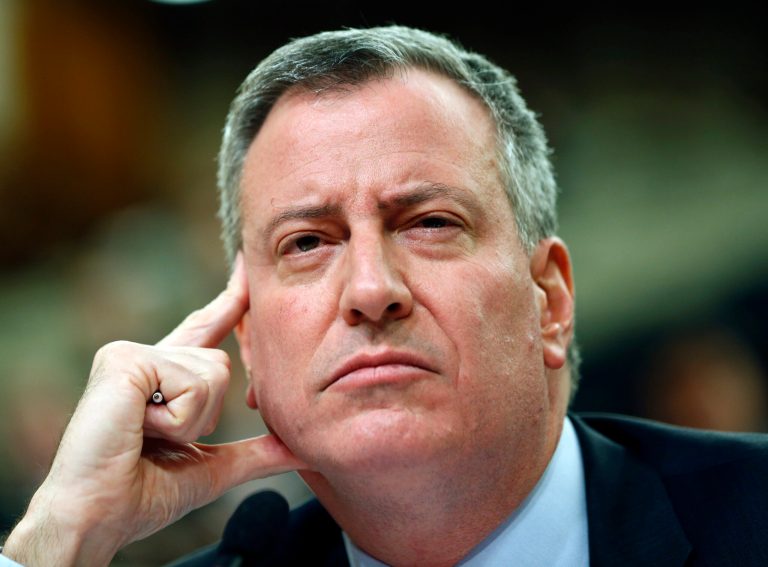 New York City Mayor Bill de Blasio listens to a question while testifying before a joint legislative budget hearing on Jan. 27 in Albany, N.Y. (AP Photo/Mike Groll)