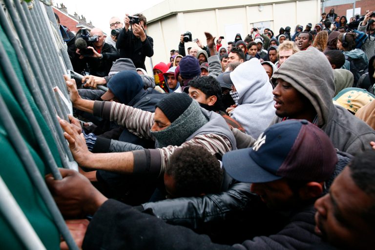 Migrants clash in France as camp tensions soar