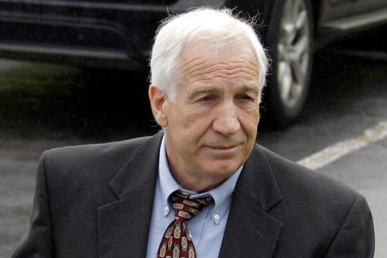   Former Penn State University assistant football coach Jerry Sandusky arrives for the first day of jury selection as his trial on 52 counts of child sexual abuse involving 10 boys over a period of 15 years gets underway at the Centre County Courthouse in Bellefonte, Pa., Tuesday, June 5, 2012. (AP Photo/Gene J. Puskar)  